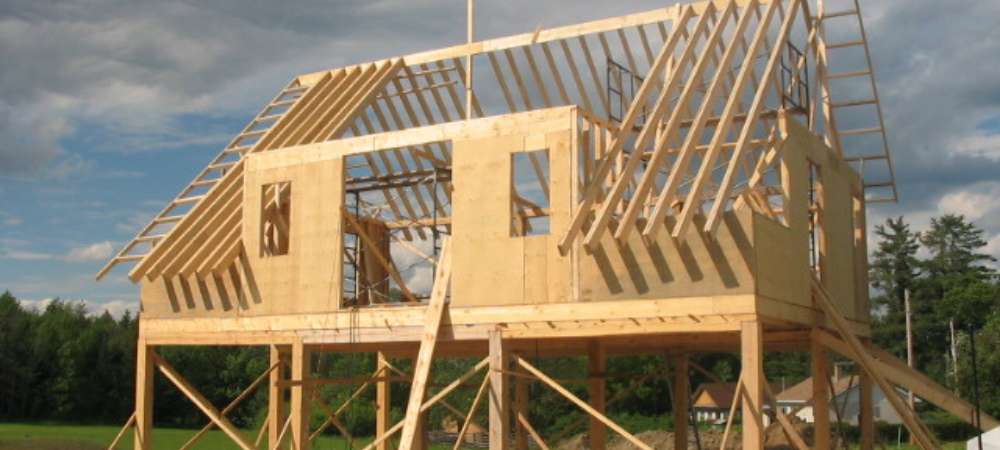 Charpente de maison en bois pour réduire l'empreinte carbone
