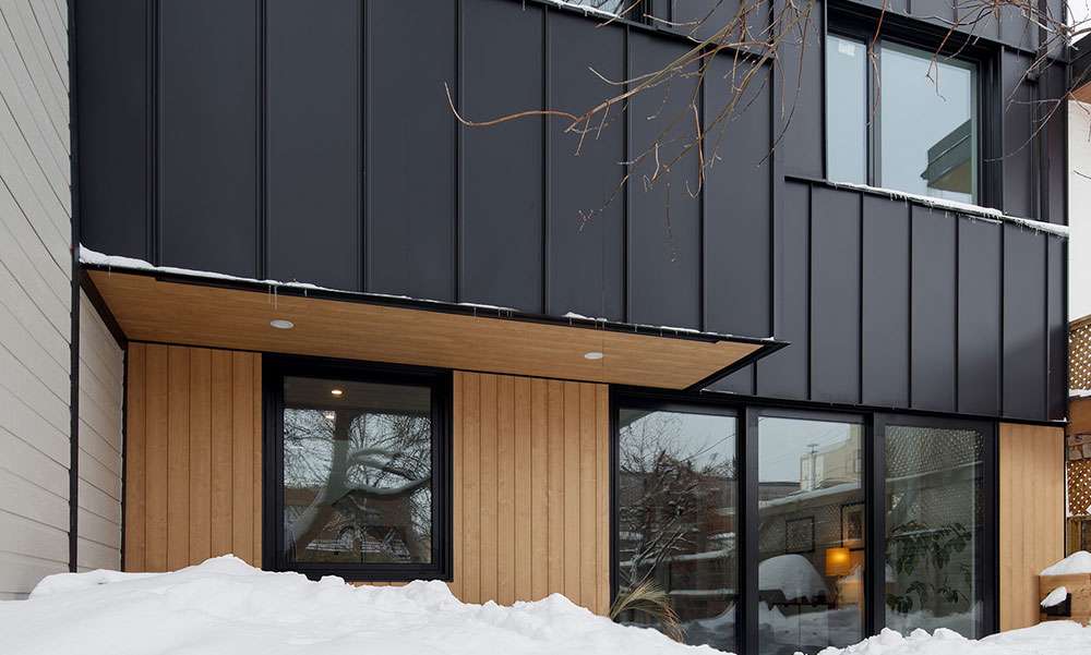 Nouveau revêtement extérieur de maison en bois