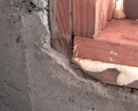 Connexion bois/béton à éviter